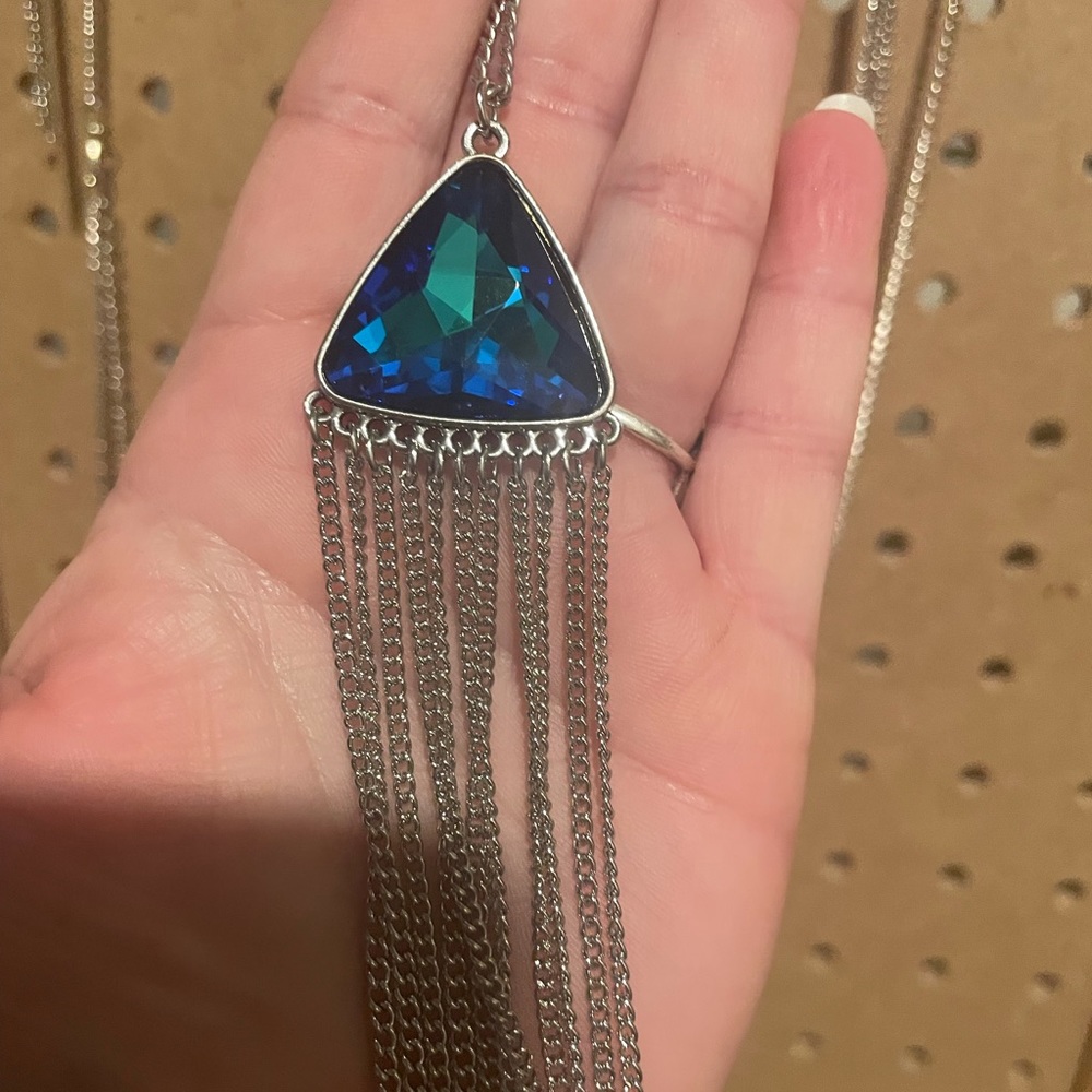 Extra long silver necklace with one triangular stone in a gorgeous blue.